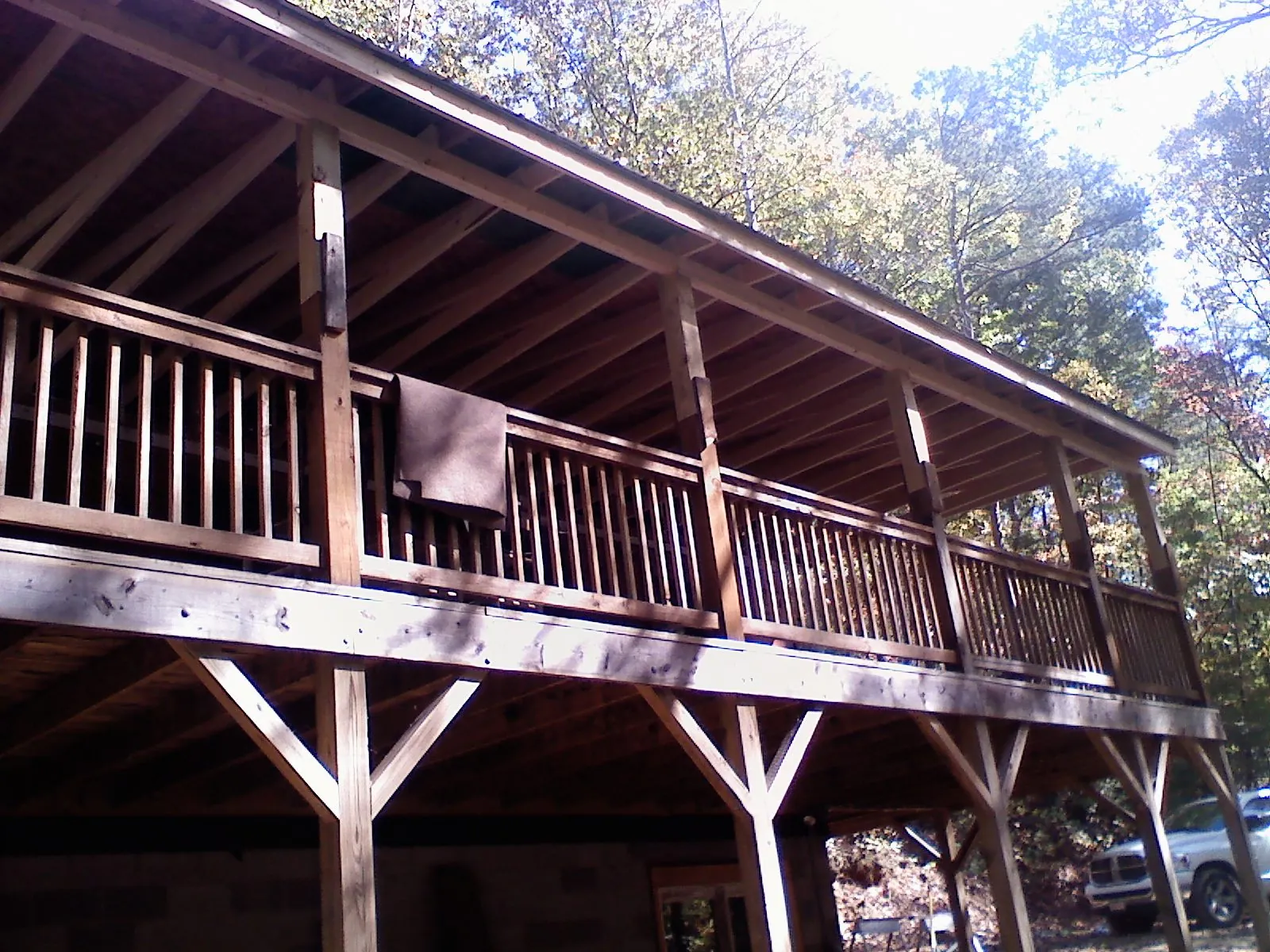 Timber framing under a new elevated porch and deck — Roof Leak Repair in Menasha by Roofing Brothers